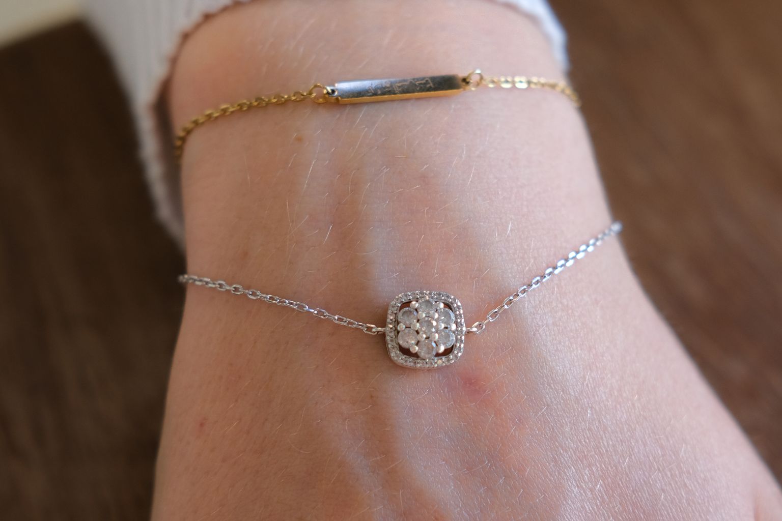 silver and gold bracelets together