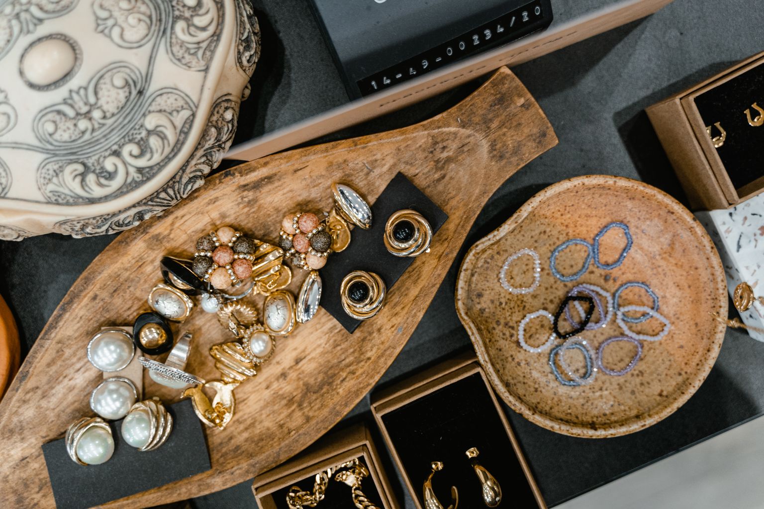 silver and gold jewelry together stored in a tray
