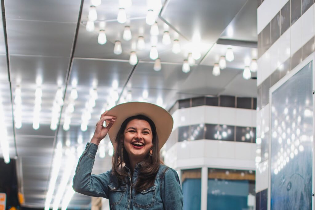 Country concert outfit with denim and a cowboy hat